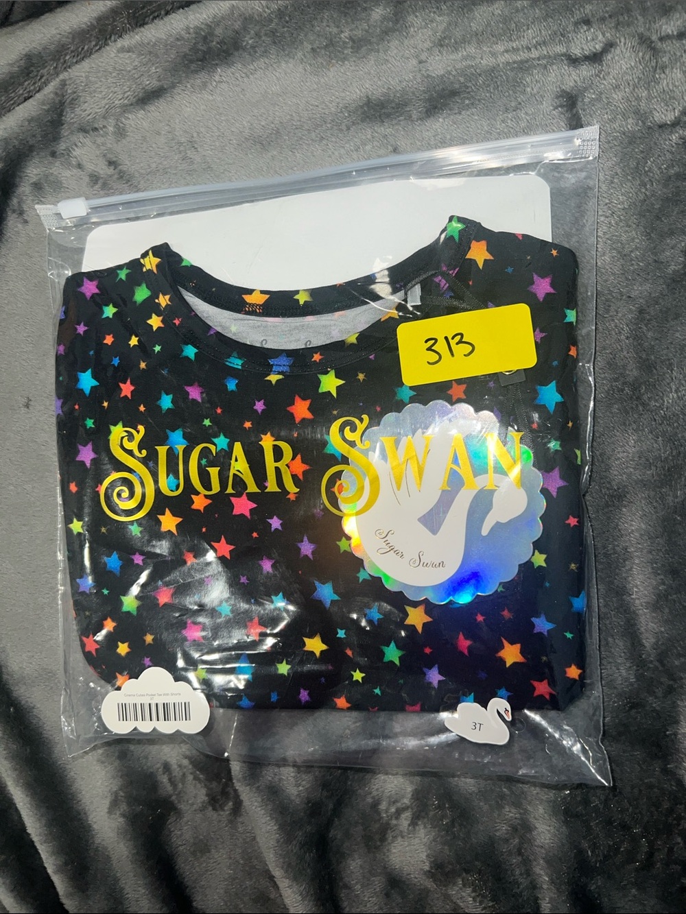 Sugar Swan Kids' Black Short Sleeve Tee with Multicolor Stars